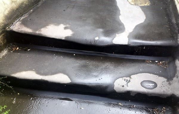 Asphalt walkway in poor condition